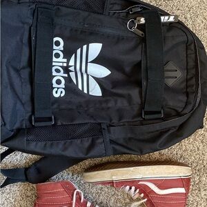 Skateboard carrier adidas back pack and old school maroon suede leather vans